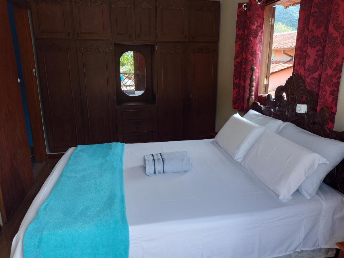 Casa Com Piscina Em *